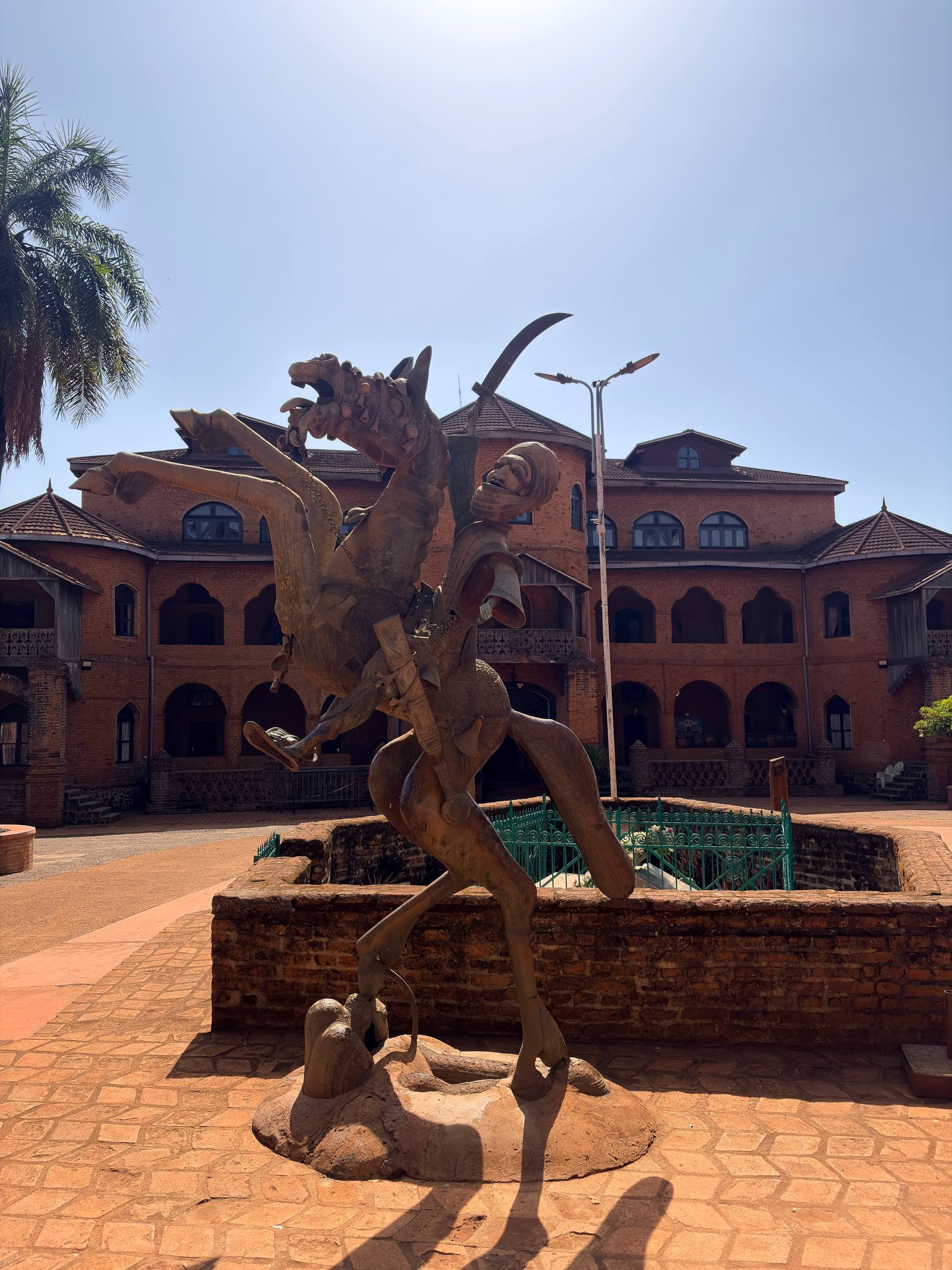Equestrian statue in front of the Bamoun Palace in Cameroon